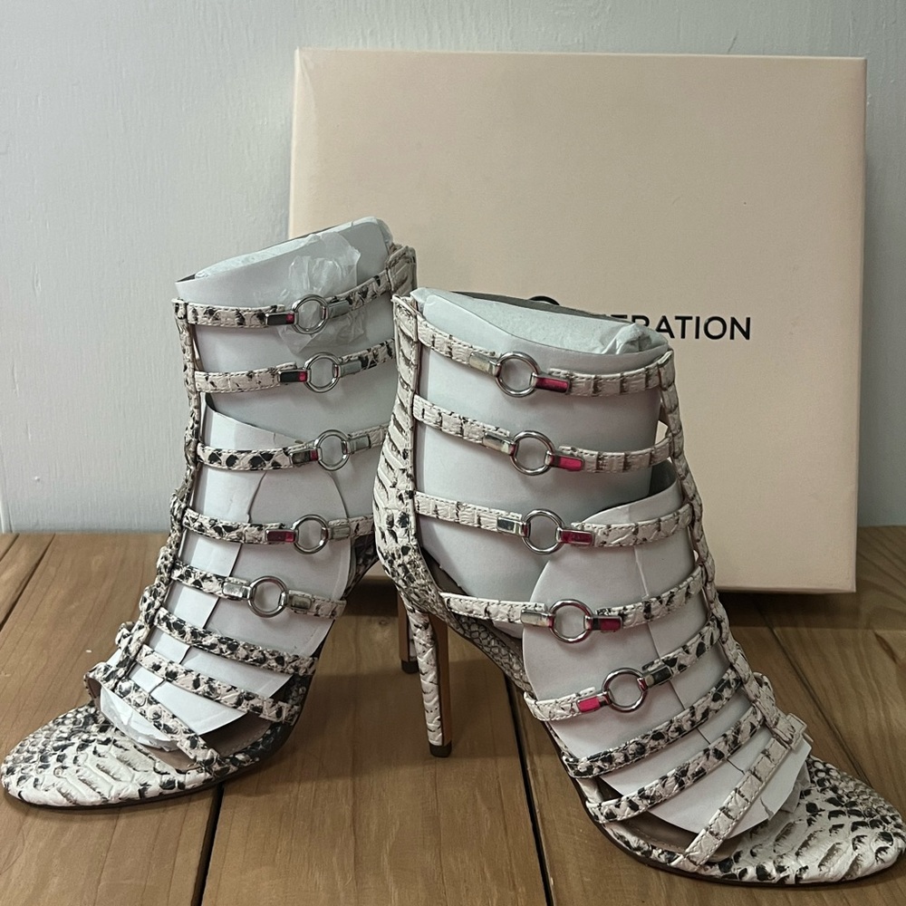 BCBGeneration Women's Snakeskin Strappy Heels